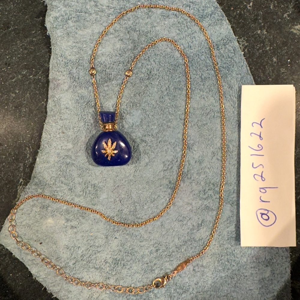 Jacquie Aiche lapis lazuli potion bottle with sweet leaf motif